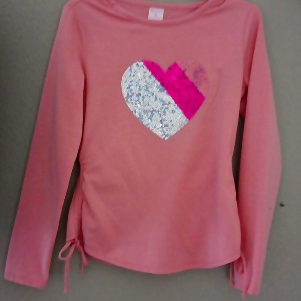 A  light or baby pink no boundaries long-sleeve Size:M (7-9) Childs shirt
